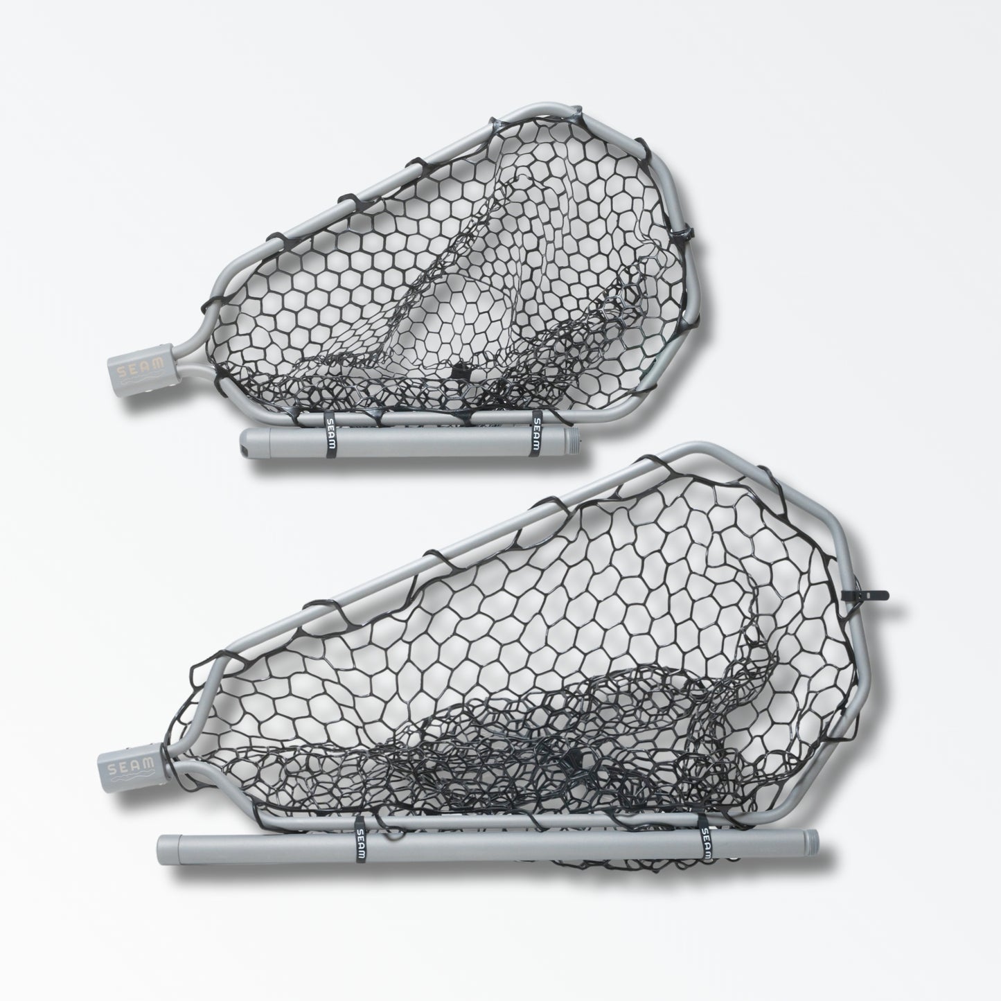 Two different sized silver landing nets for fly fishing