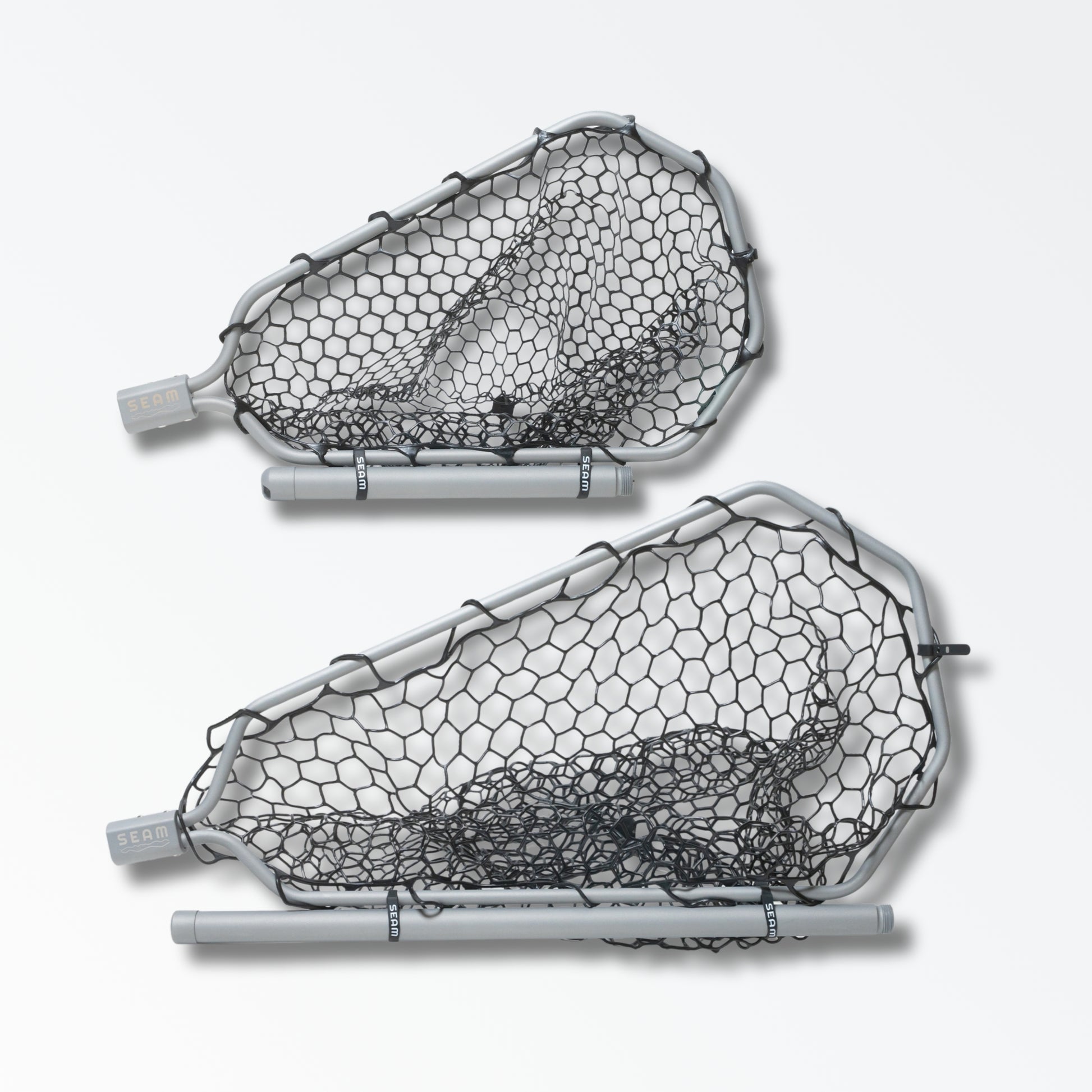 Two different sized silver landing nets for fly fishing