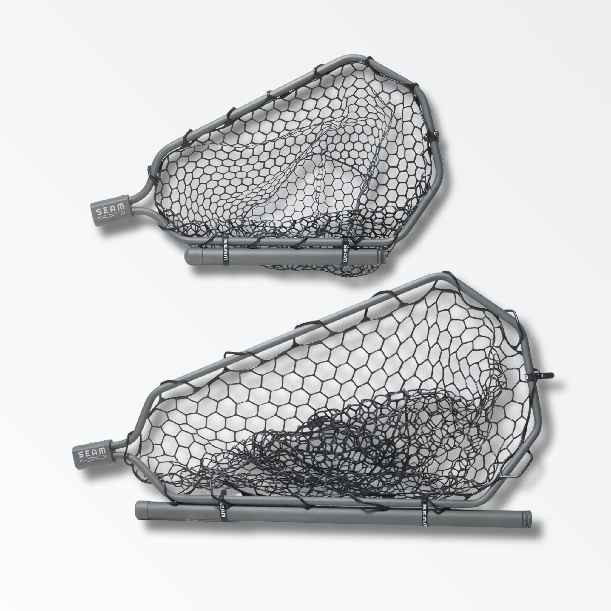 Two different sized grey landing nets for fly fishing