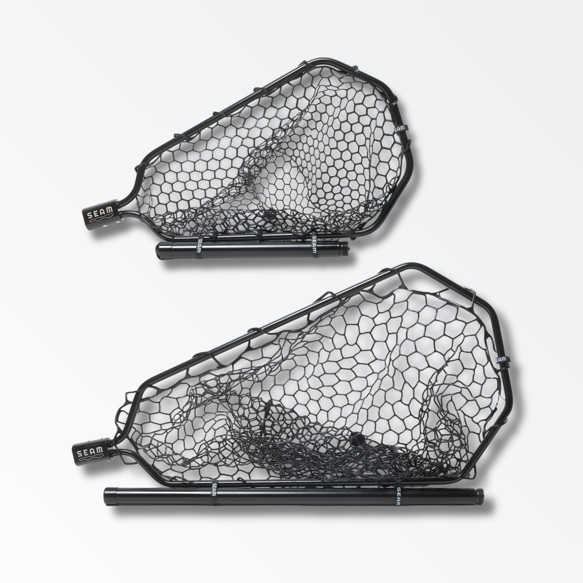 Two different sized black landing nets for fly fishing